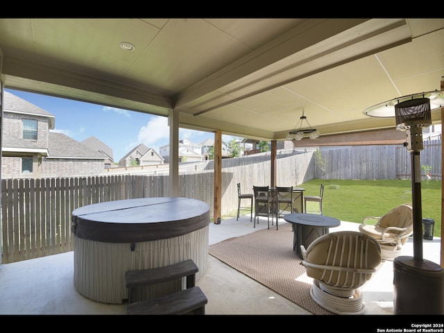 view of patio / terrace featuring a hot tub