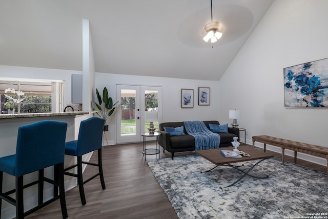 living room with high vaulted ceiling, dark wood-type flooring, french doors, and ceiling fan