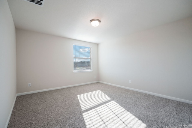 empty room with carpet floors