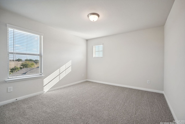 view of carpeted spare room