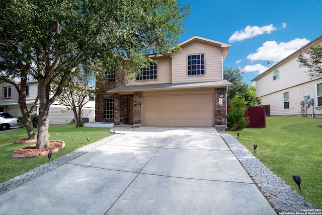 front of property with a front lawn and a garage