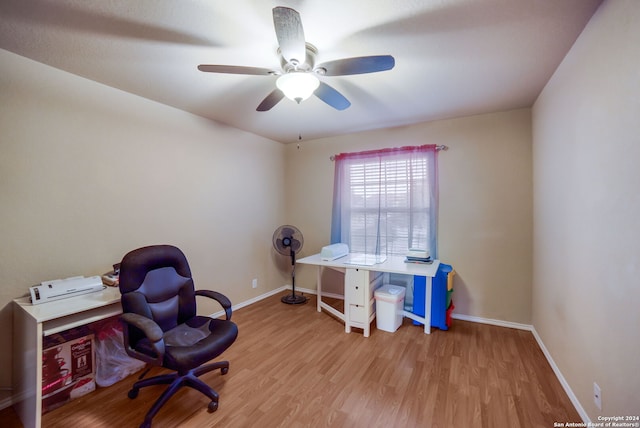 office space with light wood-type flooring and ceiling fan