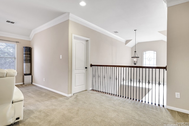 interior space with light colored carpet and ornamental molding