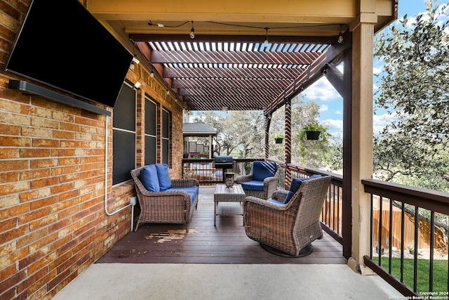 view of patio featuring a wooden deck, a pergola, and an outdoor hangout area