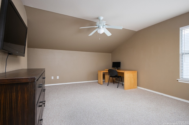 carpeted home office featuring ceiling fan and lofted ceiling