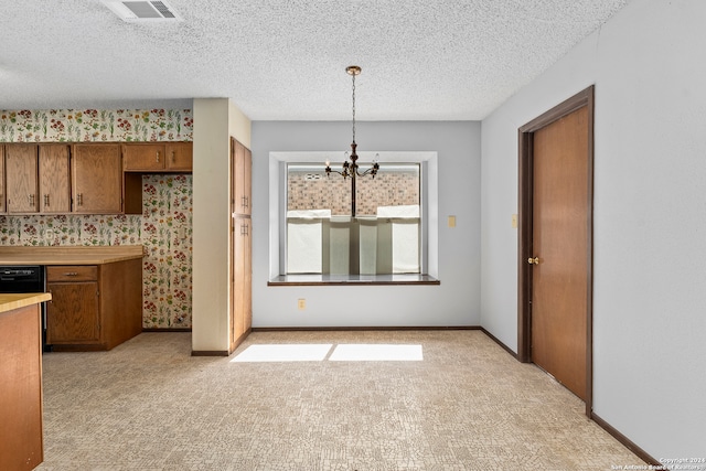 kitchen featuring light colored carpet, black dishwasher, a notable chandelier, a textured ceiling, and pendant lighting