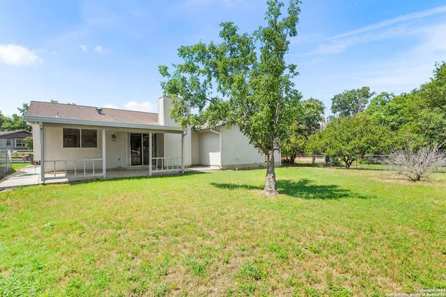 exterior space featuring a yard and a patio