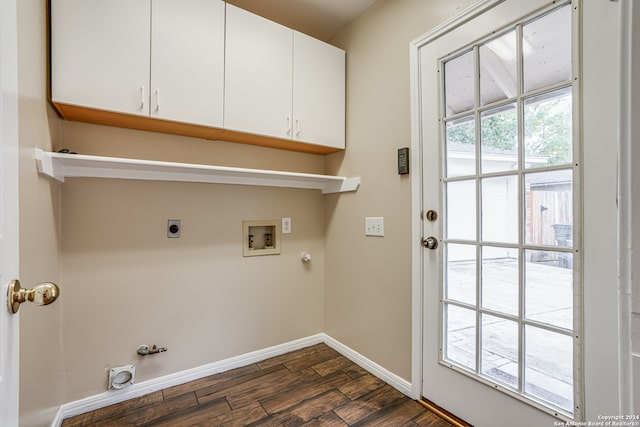 clothes washing area with cabinets, washer hookup, dark hardwood / wood-style floors, hookup for an electric dryer, and gas dryer hookup