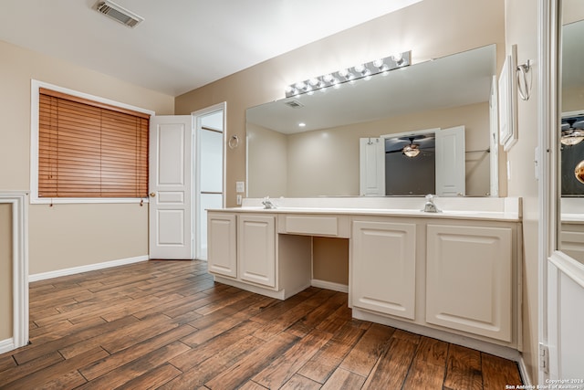 bathroom featuring vanity, hardwood / wood-style flooring, and ceiling fan