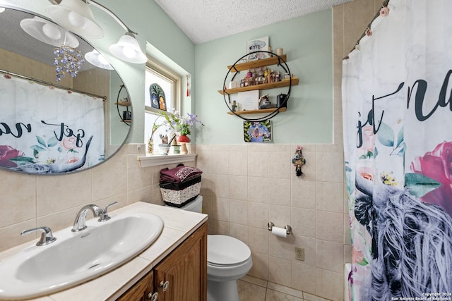 bathroom featuring tile patterned floors, a shower with curtain, toilet, a textured ceiling, and tile walls