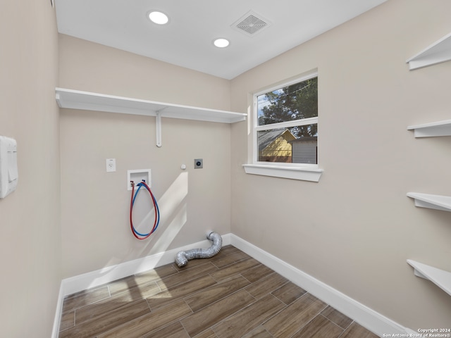 clothes washing area featuring washer hookup and electric dryer hookup