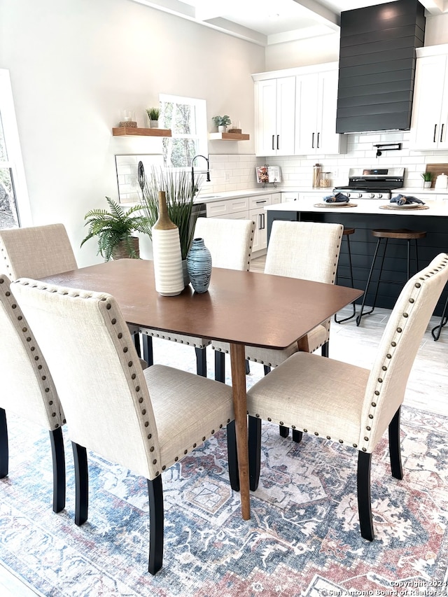 dining space featuring sink