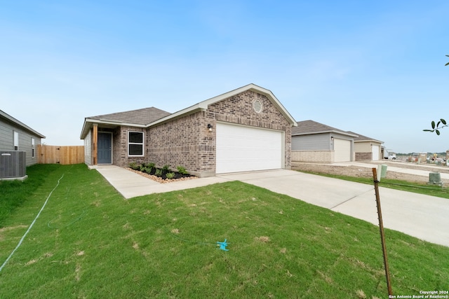 single story home with a garage, cooling unit, and a front lawn