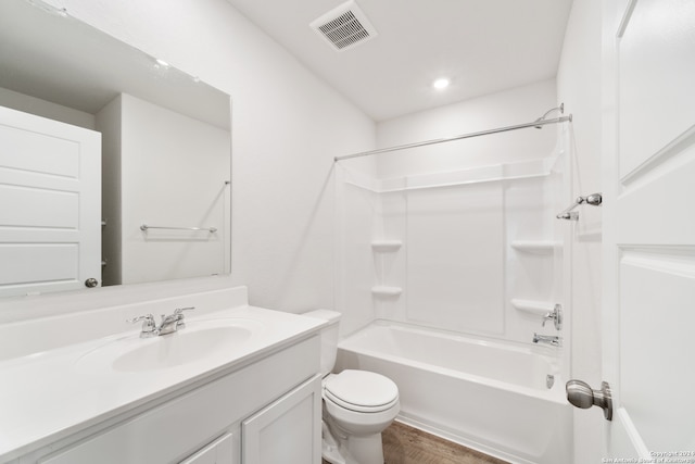 full bathroom featuring toilet, vanity, shower / bath combination, and wood-type flooring