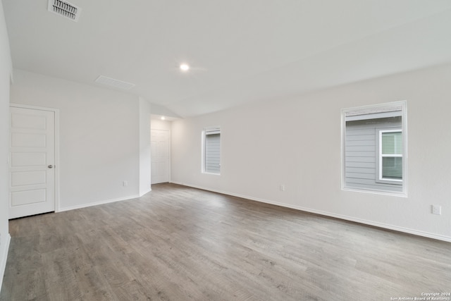 spare room with light wood-type flooring