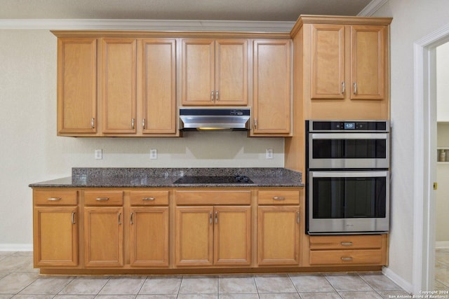 24434 Brazos Stage, San Antonio, TX 78255 - kitchen with under cabinet range hood, black electric cooktop, double oven, dark stone counters, and ornamental molding