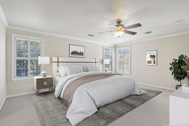 24434 Brazos Stage, San Antonio, TX 78255 - bedroom with carpet floors, crown molding, baseboards, a textured ceiling, and ceiling fan