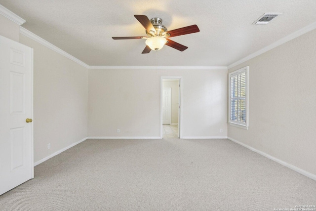 24434 Brazos Stage, San Antonio, TX 78255 - unfurnished room with crown molding, a ceiling fan, light colored carpet, and baseboards