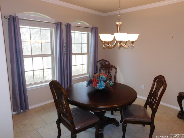 dining area with a wealth of natural light, crown molding, and a chandelier