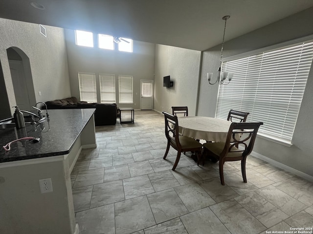 dining room featuring a chandelier