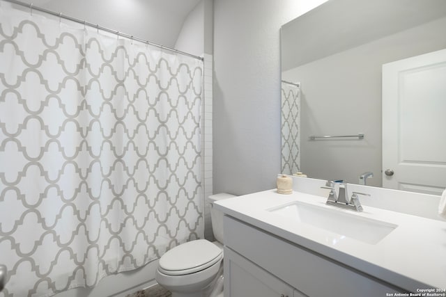 full bathroom featuring vanity, toilet, and shower / tub combo