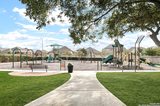 view of jungle gym with a yard