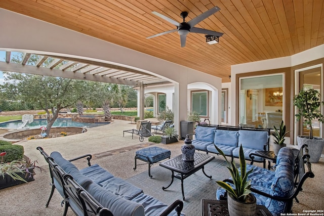 view of patio featuring ceiling fan and an outdoor living space