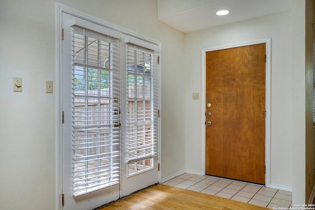 doorway featuring light wood-type flooring