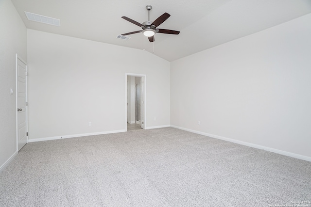 carpeted empty room with lofted ceiling and ceiling fan