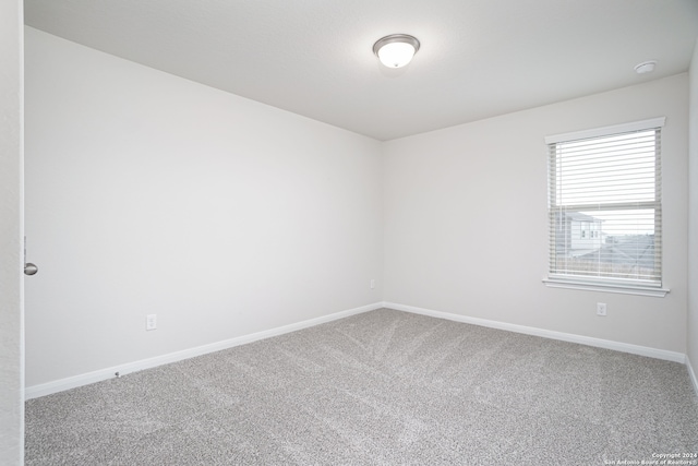 empty room featuring carpet