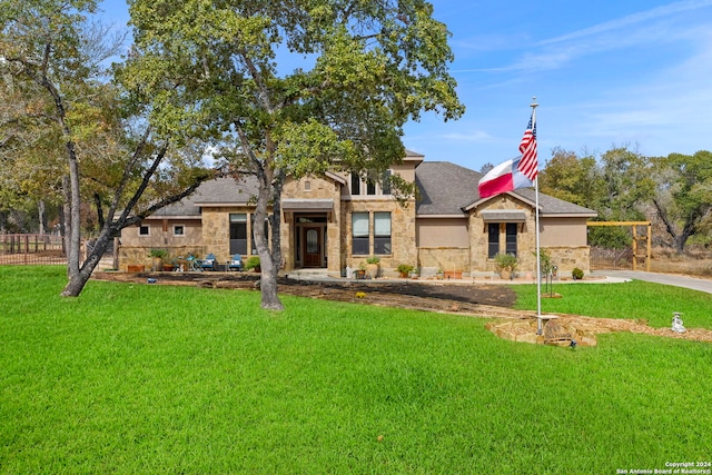 view of front of home with a front lawn