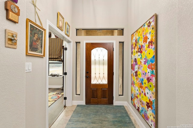 interior space featuring light tile patterned floors