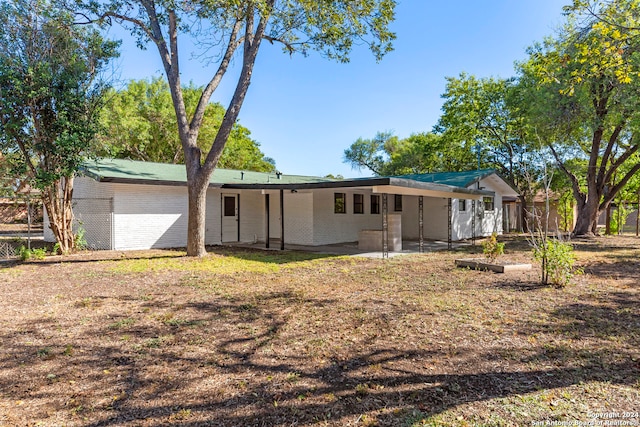 view of front of home with a patio area