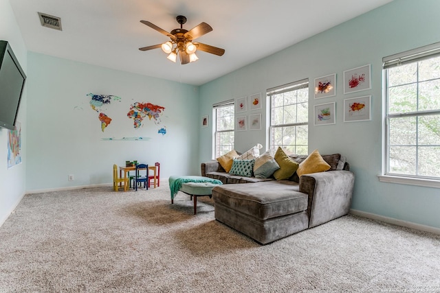 2210 Postoak Ct, San Antonio, TX 78248 - carpeted living area featuring plenty of natural light, ceiling fan, and baseboards
