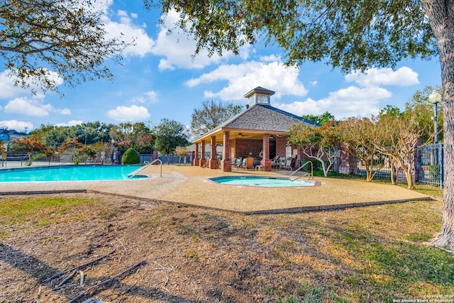 2210 Postoak Ct, San Antonio, TX 78248 - community pool featuring a ceiling fan and a patio area