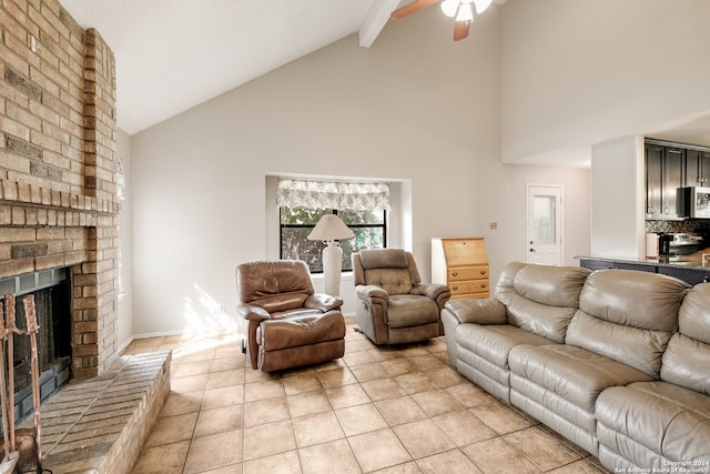 living room with high vaulted ceiling, beamed ceiling, ceiling fan, and a brick fireplace