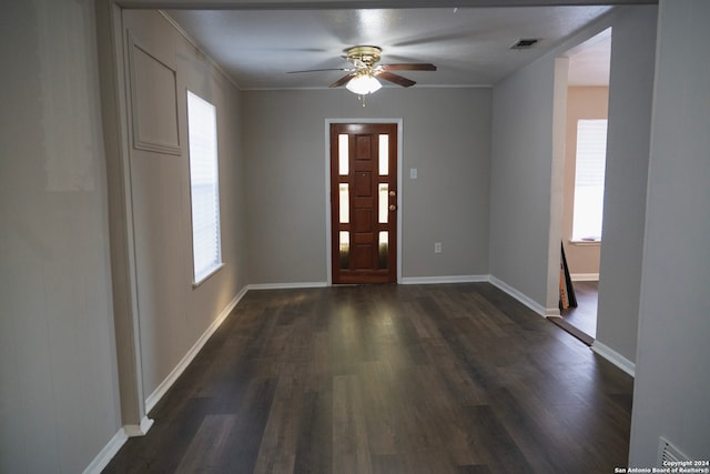 foyer featuring dark hardwood / wood-style floors and ceiling fan