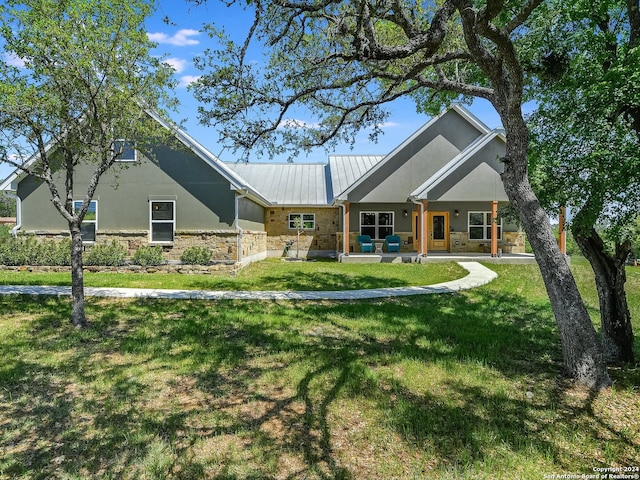 view of front of home with a front lawn