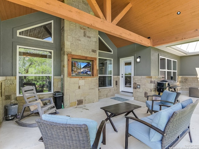 view of patio / terrace with a grill and an outdoor living space