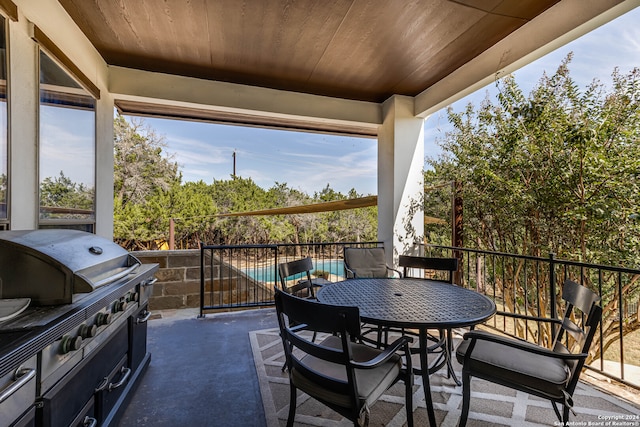 view of patio / terrace featuring a balcony