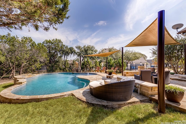 view of swimming pool with a patio area