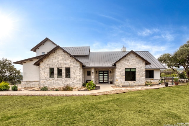 view of front of property featuring a front lawn