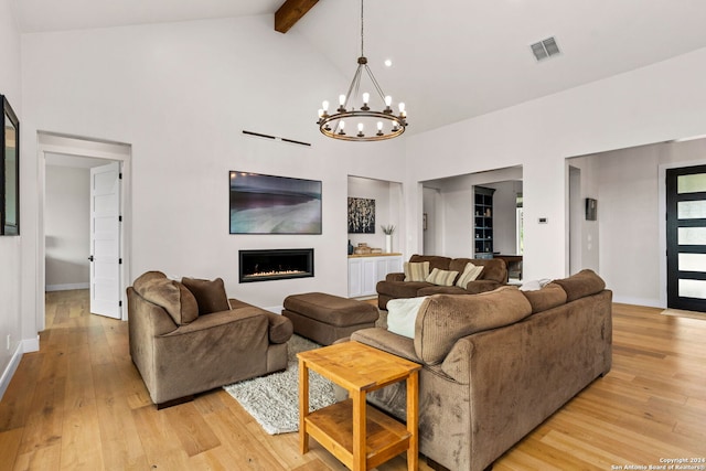 living room featuring light wood-type flooring, a chandelier, high vaulted ceiling, and beam ceiling