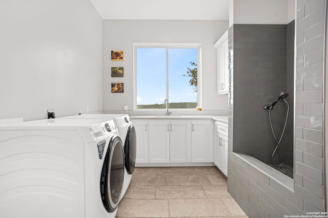 laundry area featuring sink and independent washer and dryer