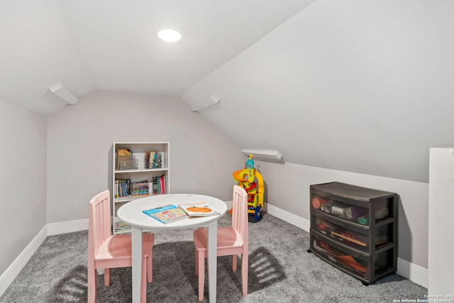 rec room with carpet and vaulted ceiling