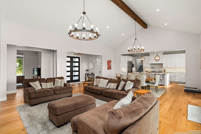 living room featuring light hardwood / wood-style floors, beam ceiling, high vaulted ceiling, and a notable chandelier