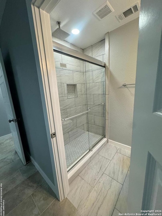 bathroom with walk in shower