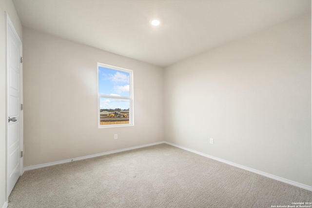 spare room featuring carpet flooring