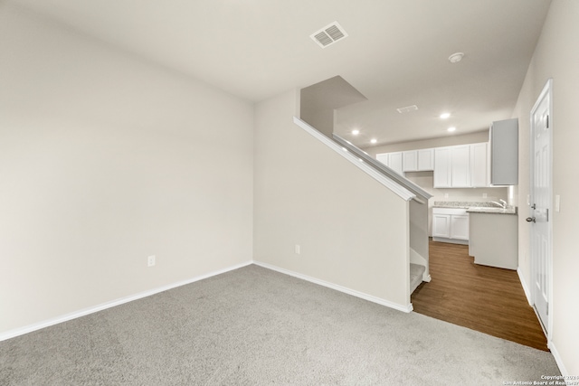 spare room featuring hardwood / wood-style floors