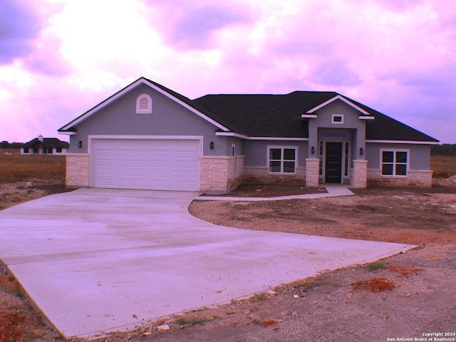 view of front of property featuring a garage